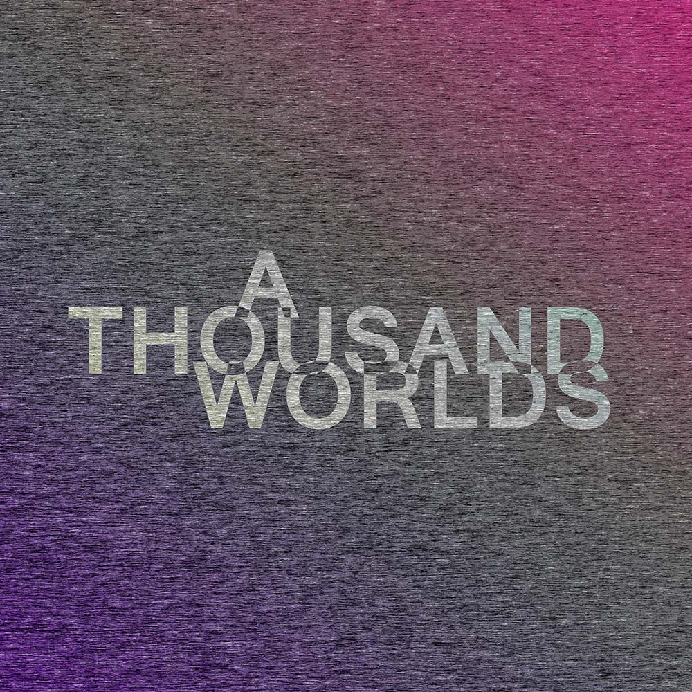 the album artwork for A Thousand Worlds, which centers the title text above a TV-static-like background gradient from purple to dark pink